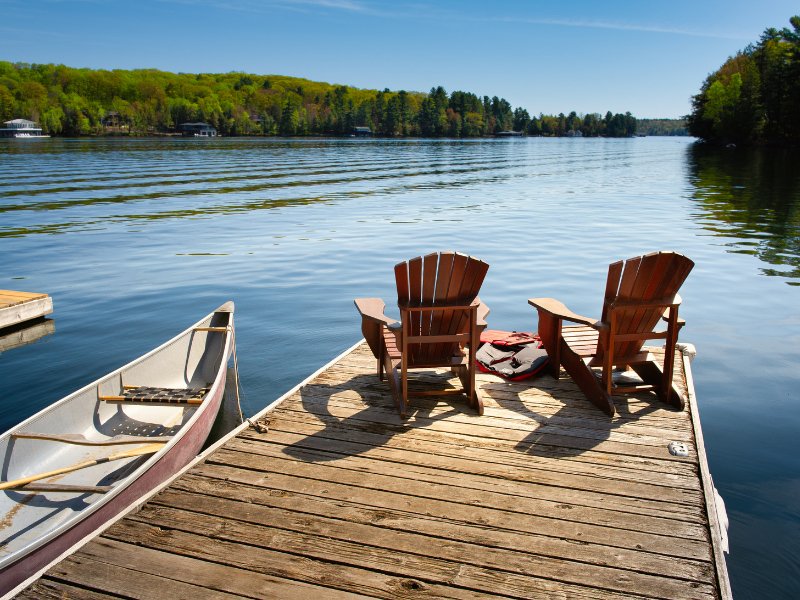 two chairs sitting on dock on lake in Georgia